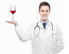 doctor holding a glass of wine